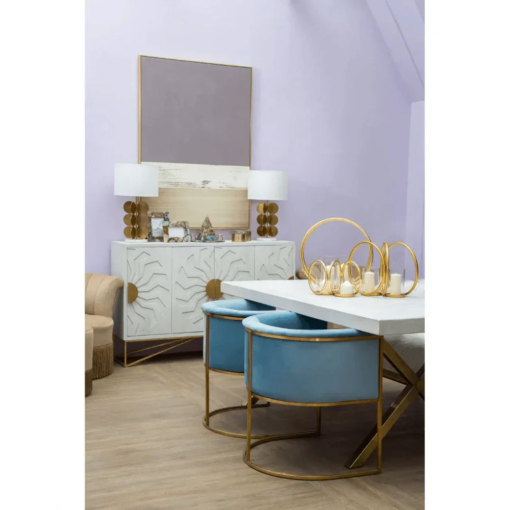 Buy modern dining room furniture set online, luxury gold base chairs, blue velvet seating, sideboard decor